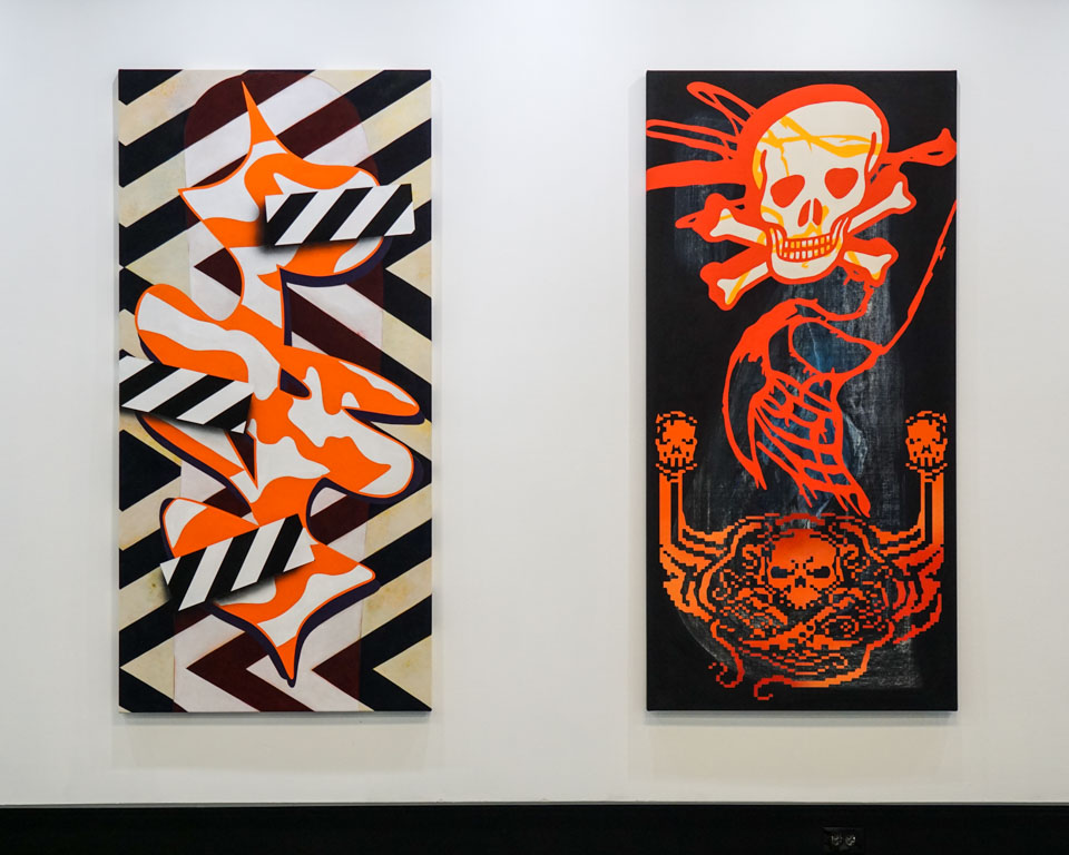 A set of sharply painted canvases by Jay Giroux.